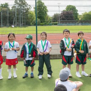 Students receiving their medals